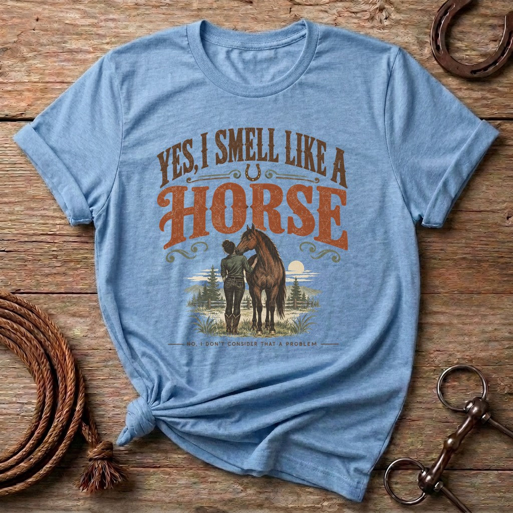 Light Blue Yes I Smell Like A Horse funny western t-shirt with a cowgirl and her bay horse
