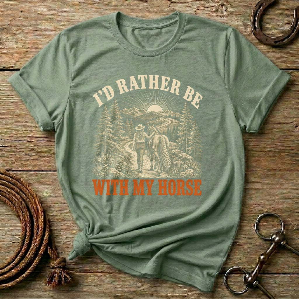 Sage I'd Rather Be With My Horse t-shirt with a cowgirl walking her horse on a mountain trail